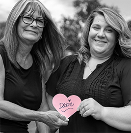 Life-Assist employees holding Project Pink heart with Debbie’s name, to honor her and raise breast cancer awareness
